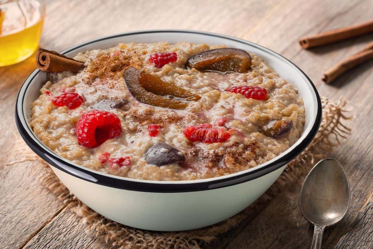 Adventure Menu Rice Porridge with Raspberries, Plums, and Cinnamon lifestyle